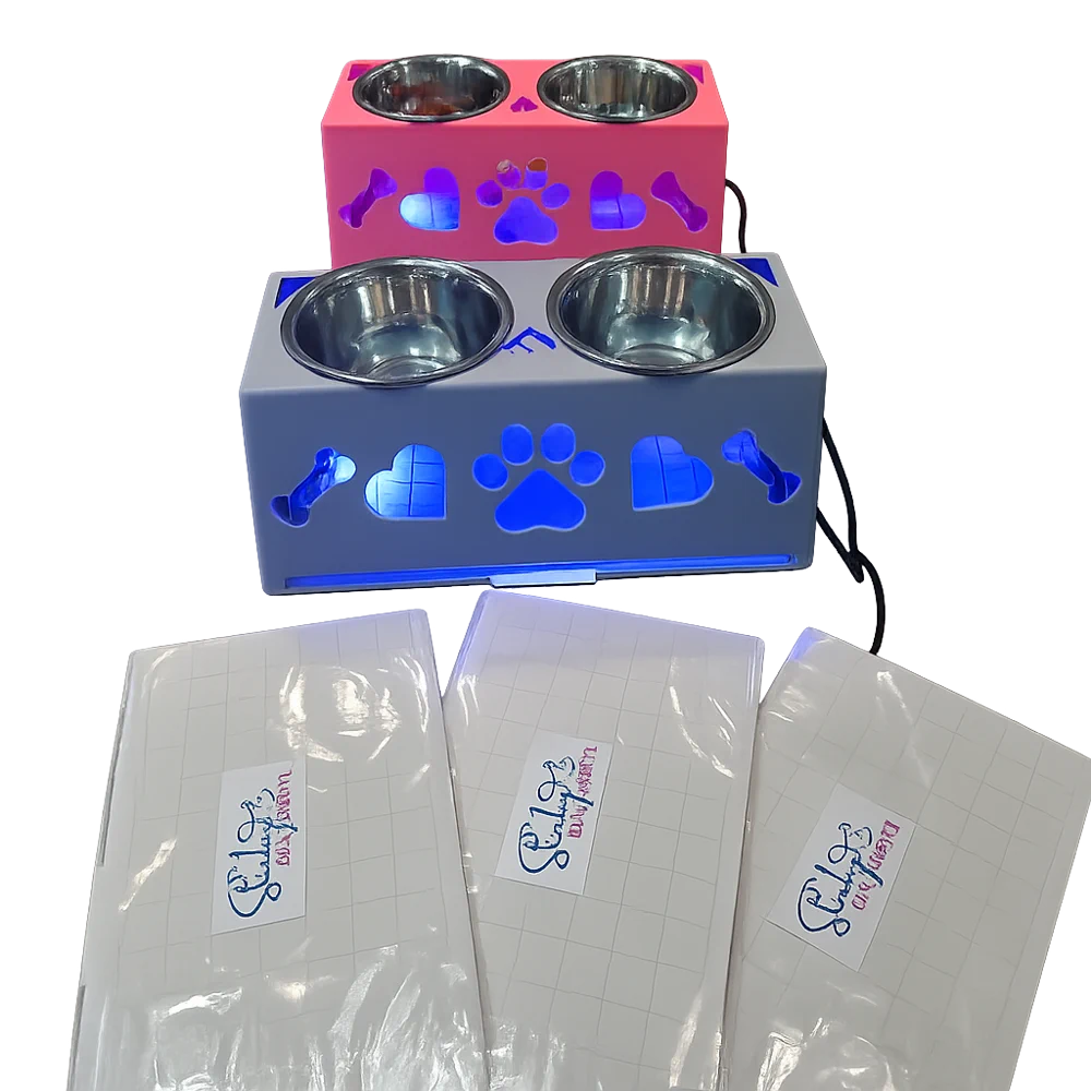 Grey and pink Sticky Fly Bowls displayed with replacement glue boards
